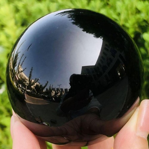 Natural black obsidian sphere - black,